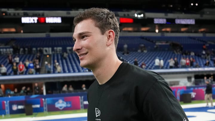 Feb 28, 2026; Indianapolis, IN, USA; Indiana quarterback Fernando Mendoza (QB11) looks on during the NFL Scouting Combine at Lucas Oil Stadium. Mandatory Credit: Kirby Lee-Imagn Images