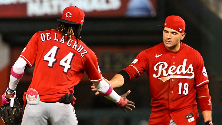 Cincinnati Reds first baseman Joey Votto (19) and shortstop Elly De La Cruz (44) celebrate