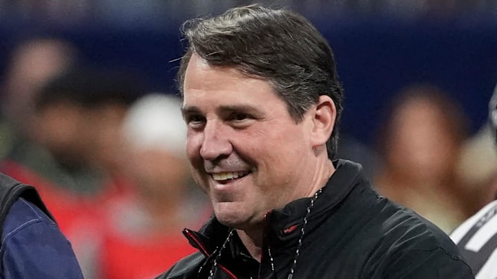 Georgia Co-Defensive Coordinator Will Muschamp looks on before the start of the SEC championship game against Texas in Atlanta, on Saturday, Dec. 7, 2024.