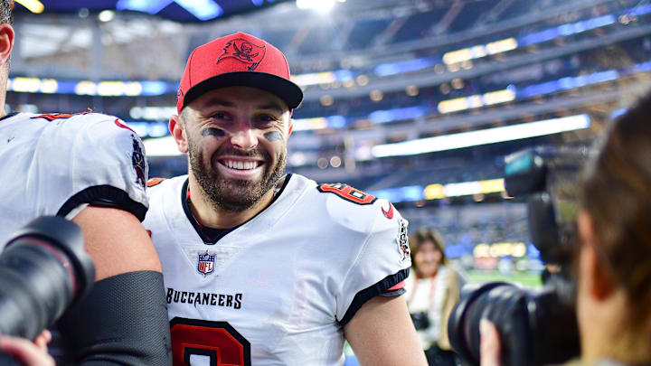 Dec 15, 2024; Inglewood, California, USA; Tampa Bay Buccaneers guard Ben Bredeson (68) and quarterback Baker Mayfield (6) celebrate the victory against the Los Angeles Chargers at SoFi Stadium. Mandatory Credit: Gary A. Vasquez-Imagn Images Dec 15, 2024; Inglewood, California, USA; Tampa Bay Buccaneers guard Ben Bredeson (68) and quarterback Baker Mayfield (6) celebrate the victory against the Los Angeles Chargers at SoFi Stadium. Mandatory Credit: Gary A. Vasquez-Imagn Images