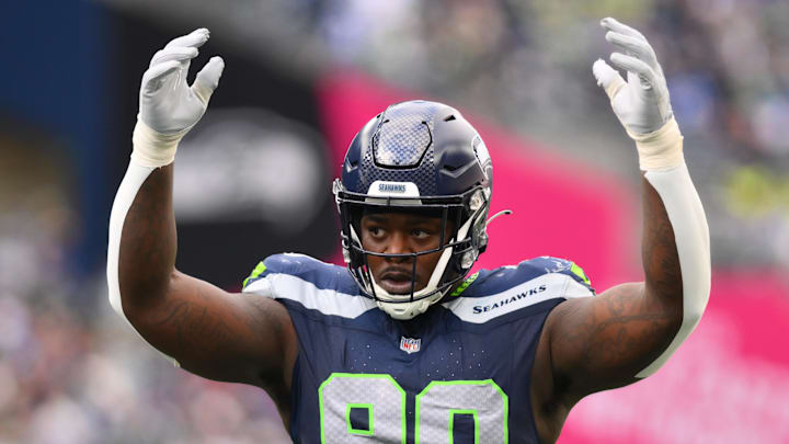 Oct 22, 2023; Seattle, Washington, USA; Seattle Seahawks defensive tackle Jarran Reed (90) interacts with the fans during the second half against the Arizona Cardinals at Lumen Field.