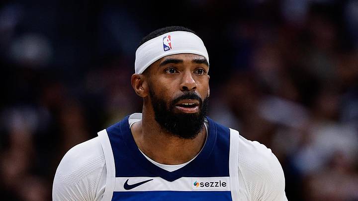 Apr 27, 2026; Denver, Colorado, USA; Minnesota Timberwolves guard Mike Conley (10) dribbles the ball up court in the first quarter against the Denver Nuggets during game five of the first round of the 2026 NBA Playoffs at Ball Arena. Mandatory Credit: Isaiah J. Downing-Imagn Images