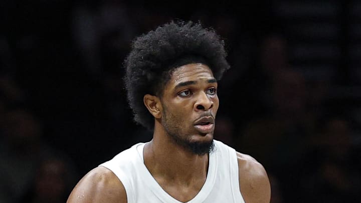 Portland Trail Blazers guard Scoot Henderson dribbles up court against the Brooklyn Nets. Portland Trail Blazers guard Scoot Henderson dribbles up court against the Brooklyn Nets.