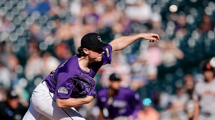 Colorado Rockies relief pitcher Ryan Rolison (50) pitches in the ninth inning against the San Francisco Giants at Coors Field. Colorado Rockies relief pitcher Ryan Rolison (50) pitches in the ninth inning against the San Francisco Giants at Coors Field.