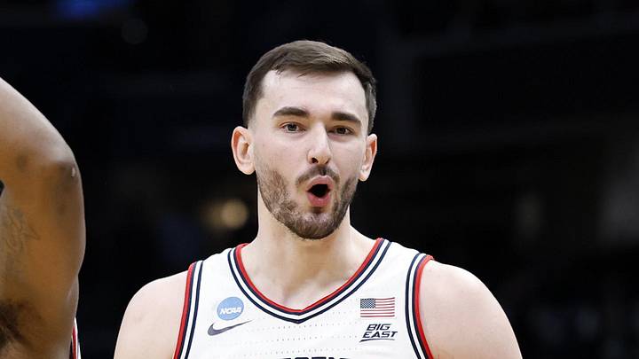 Mar 27, 2026; Washington, DC, USA;UConn Huskies forward Alex Karaban (11) reacts after defeating the Michigan State Spartans in a Sweet Sixteen game of the East Regional of the men's 2026 NCAA Tournament at Capital One Arena. Mandatory Credit: Amber Searls-Imagn Images