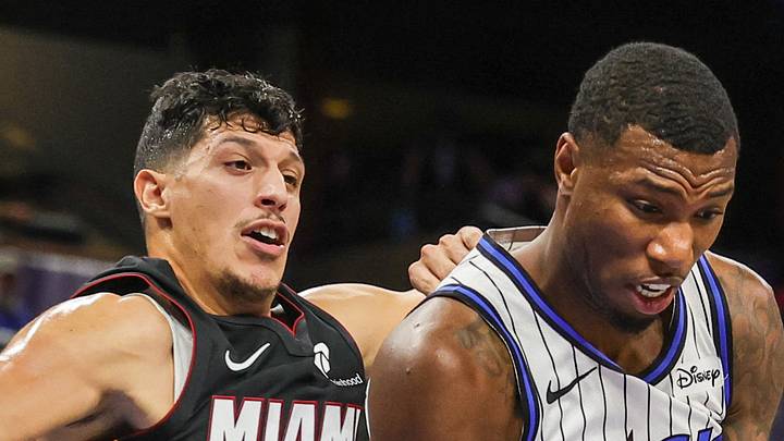 Orlando Magic forward Jamal Cain grabs the rebound in front of Miami Heat forward Simone Fontecchio. Orlando Magic forward Jamal Cain grabs the rebound in front of Miami Heat forward Simone Fontecchio.