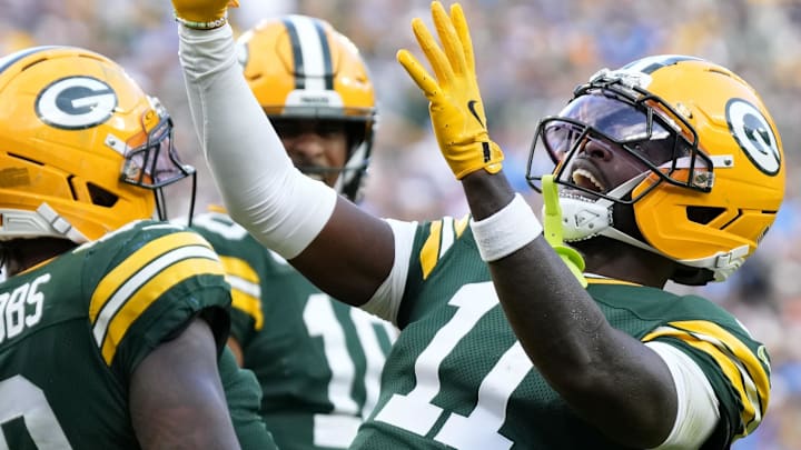 Green Bay Packers wide receiver Jayden Reed (11) celebrates a touchdown against the Detroit Lions in Week 1.