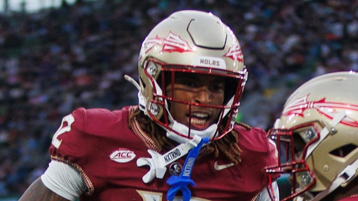 Aug 24, 2024; Dublin, IRL; Florida State University defensive back Edwin Joseph celebrates a tackle against Georgia Tech with defensive back Conrad Hussey at Aviva Stadium. Mandatory Credit: Tom Maher/INPHO via Imagn Images