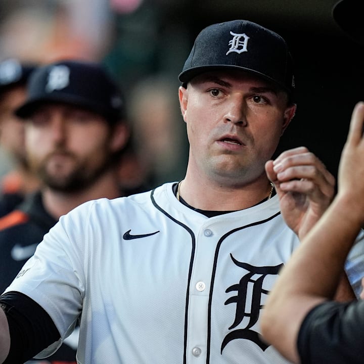 Detroit Tigers pitcher Tarik Skubal high-fives teammates.