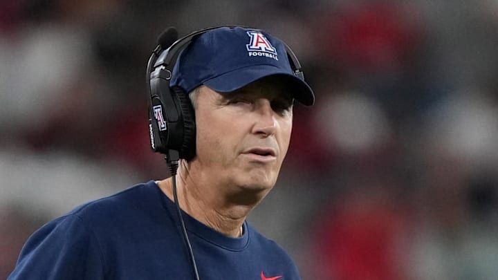 Jan 2, 2026; San Diego, CA, USA; Arizona Wildcats head coach Brent Brennan reacts against the SMU Mustangs in the first half during the Holiday Bowl at Snapdragon Stadium. Mandatory Credit: Kirby Lee-Imagn Images
