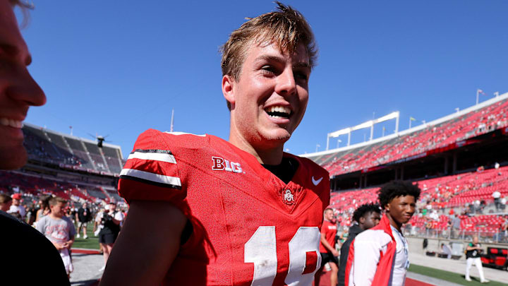 Sep 21, 2024; Columbus, Ohio, USA;  Ohio State Buckeyes quarterback Will Howard (18) celebrates hfollowing the win against the Marshall Thundering Herd at Ohio Stadium. Mandatory Credit: Joseph Maiorana-Imagn Images