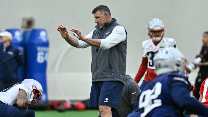 May 9, 2025; Foxborough, MA, USA; New England Patriots head coach Mike Vrabel (c) works with players at rookie camp at Gillette Stadium. Mandatory Credit: Eric Canha-Imagn Images