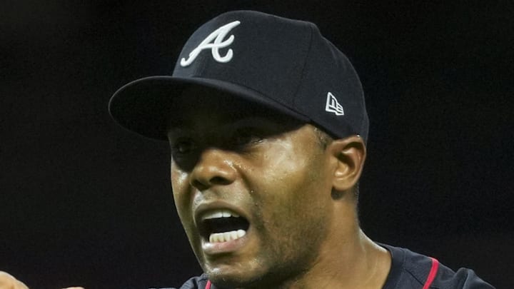 Atlanta Braves pitcher Raisel Iglesias (26) reacts after the final out the game against the Cincinnati Reds at Great American Ball Park on July 31. Atlanta Braves pitcher Raisel Iglesias (26) reacts after the final out the game against the Cincinnati Reds at Great American Ball Park on July 31.