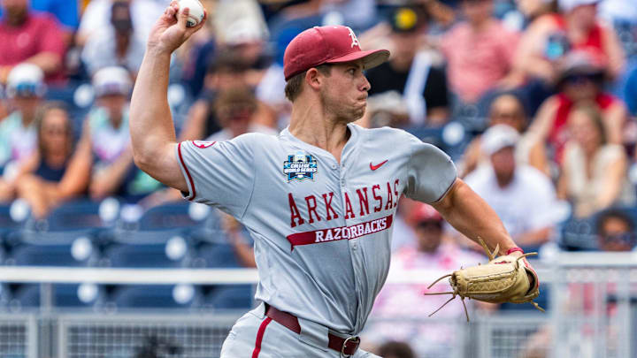 Jun 16, 2025; Omaha, Neb, USA; Arkansas Razorbacks starting pitcher Gage Wood (14) pitches against the Murray State Racers during the first inning at Charles Schwab Field.