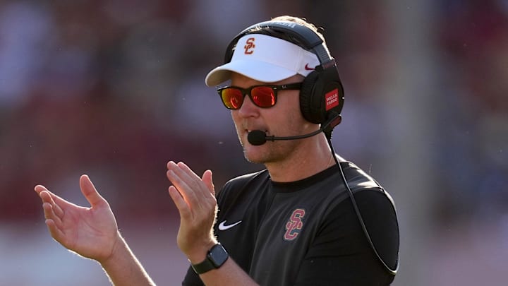 Aug 30, 2025; Los Angeles, California, USA; Southern California Trojans head coach Lincoln Riley watches from the sidelines against the Missouri State Bears in the first half at United Airlines Field at Los Angeles Memorial Coliseum. Mandatory Credit: Kirby Lee-Imagn Images Aug 30, 2025; Los Angeles, California, USA; Southern California Trojans head coach Lincoln Riley watches from the sidelines against the Missouri State Bears in the first half at United Airlines Field at Los Angeles Memorial Coliseum. Mandatory Credit: Kirby Lee-Imagn Images