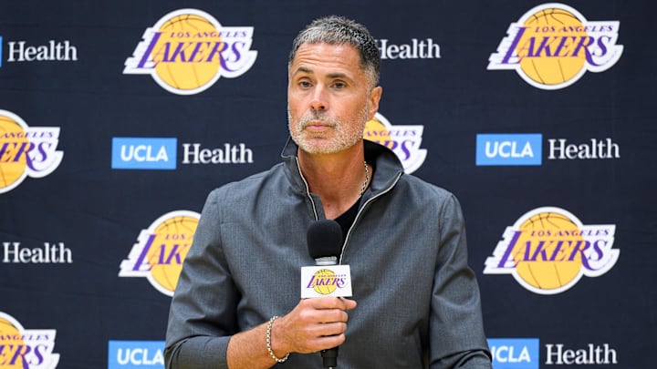 Sep 25, 2025; El Segundo, CA, USA; Los Angeles Lakers general manager Rob Pelinka, left, speaks during a press conference to preview the 2025-26 season at UCLA Health Training Center. Mandatory Credit: William Liang-Imagn Images