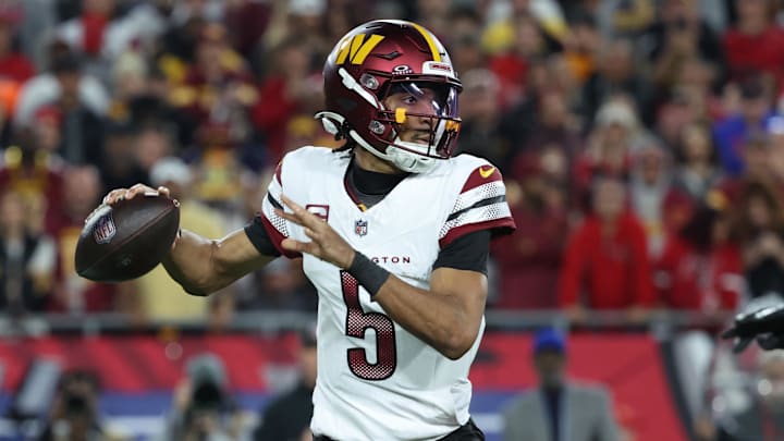 Jan 12, 2025; Tampa, Florida, USA; Washington Commanders quarterback Jayden Daniels (5) throws during the second quarter of a NFC wild card playoff against the Tampa Bay Buccaneers at Raymond James Stadium. Mandatory Credit: Kim Klement Neitzel-Imagn Images Jan 12, 2025; Tampa, Florida, USA; Washington Commanders quarterback Jayden Daniels (5) throws during the second quarter of a NFC wild card playoff against the Tampa Bay Buccaneers at Raymond James Stadium. Mandatory Credit: Kim Klement Neitzel-Imagn Images