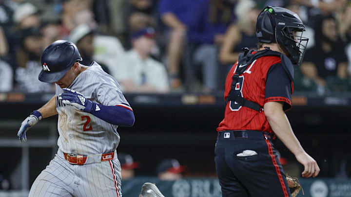 Minnesota Twins shortstop Brooks Lee (2) scores against the Chicago White Sox during the ninth inning at Rate Field. Minnesota Twins shortstop Brooks Lee (2) scores against the Chicago White Sox during the ninth inning at Rate Field.