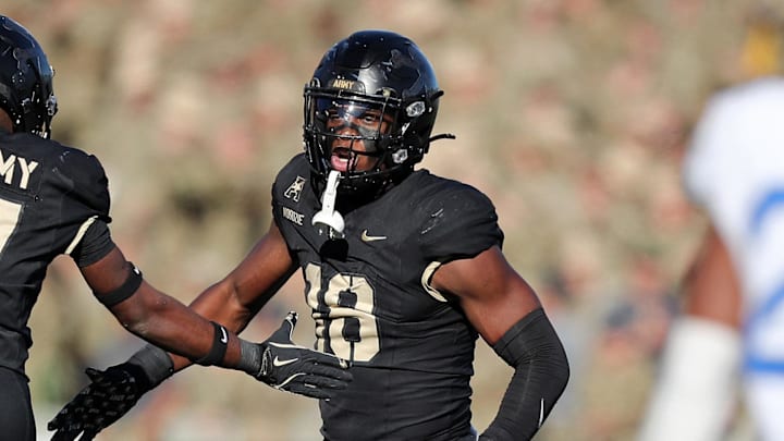 Nov 2, 2024; West Point, New York, USA; Army Black Knights linebacker Elo Modozie (18) celebrates a sack against the Air Force Falcons during the second half at Michie Stadium. Mandatory Credit: Danny Wild-Imagn Images