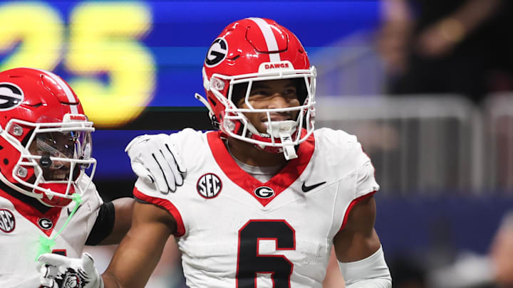 Dec 6, 2025; Atlanta, GA, USA; Georgia Bulldogs defensive back Daylen Everette (6) celebrates an interception with Georgia Bulldogs defensive back Kj Bolden (4) during the second quarter during the 2025 SEC Championship game at Mercedes-Benz Stadium. Mandatory Credit: Brett Davis-Imagn Images