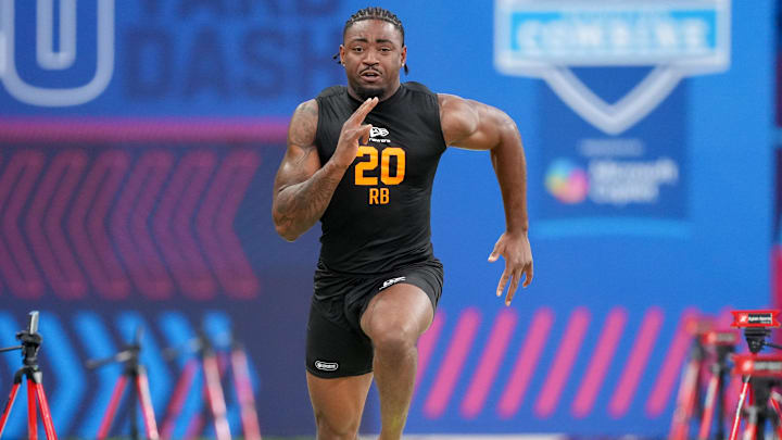 Feb 28, 2026; Indianapolis, IN, USA; Arkansas running back Mike Washington Jr. (RB20) during the NFL Scouting Combine at Lucas Oil Stadium. Feb 28, 2026; Indianapolis, IN, USA; Arkansas running back Mike Washington Jr. (RB20) during the NFL Scouting Combine at Lucas Oil Stadium.
