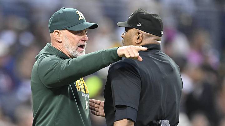 May 23, 2026; San Diego, California, USA; Athletics manager Mark Kotsay argues a call with umpire Laz Diaz during the third inning against the San Diego Padres at Petco Park. Mandatory Credit: Denis Poroy-Imagn Images
