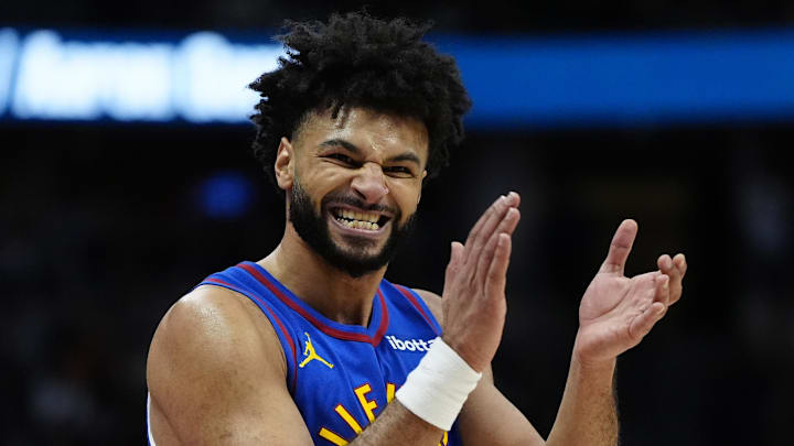 Jan 23, 2025; Denver, Colorado, USA; Denver Nuggets guard Jamal Murray (27) reacts in the second quarter against the Sacramento Kings at Ball Arena. Mandatory Credit: Ron Chenoy-Imagn Images