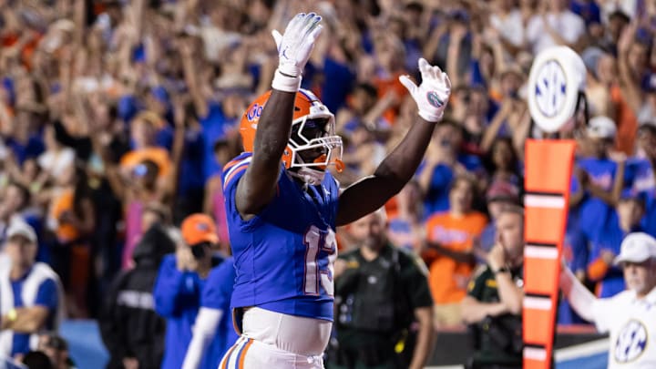 Oct 19, 2024; Gainesville, Florida, USA; Florida Gators running back Jadan Baugh (13) gestures after scoring a touchdown against the Kentucky Wildcats during the first half at Ben Hill Griffin Stadium. Mandatory Credit: Matt Pendleton-Imagn Images