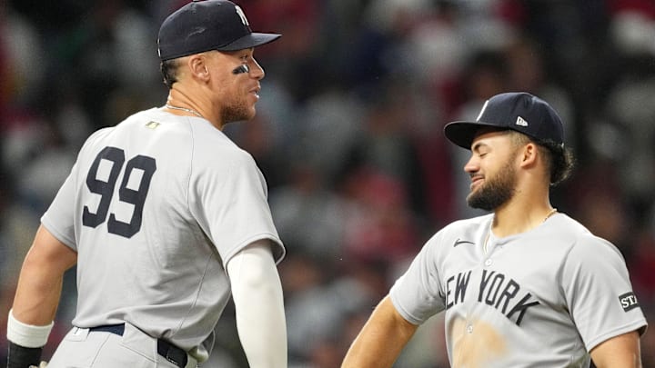 New York Yankees designated hitter Aaron Judge (99) and left fielder Jasson Domínguez (24)