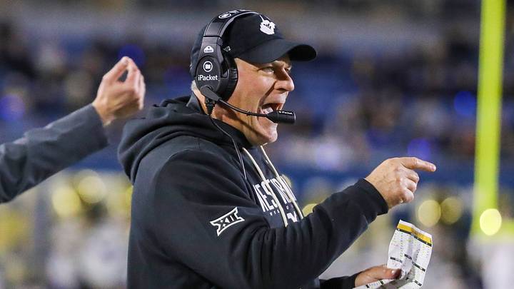 Oct 25, 2025; Morgantown, West Virginia, USA; West Virginia Mountaineers head coach Rich Rodriguez calls out a play during the third quarter against the Texas Christian University Horned Frogs at Milan Puskar Stadium. Mandatory Credit: Ben Queen-Imagn Images