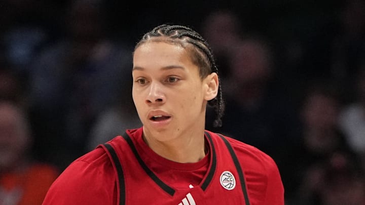 Mar 12, 2026; Charlotte, NC, USA; NC State Wolfpack guard Matt Able (3) brings the ball up the court in the first half at Spectrum Center. Mandatory Credit: Bob Donnan-Imagn Images