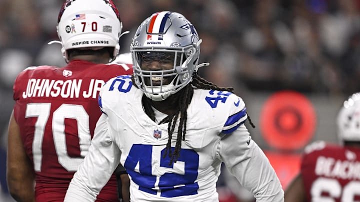 Nov 3, 2025; Arlington, Texas, USA; Dallas Cowboys defensive end Jadeveon Clowney (42) reacts after a sack against Arizona Cardinals quarterback Jacoby Brissett (7) in the first half at AT&T Stadium. Mandatory Credit: Jerome Miron-Imagn Images