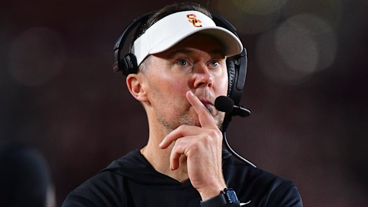 Nov 7, 2025; Los Angeles, California, USA; Southern California Trojans head coach Lincoln Riley watches game action against the Northwestern Wildcats during the second half at the Los Angeles Memorial Coliseum. Mandatory Credit: Gary A. Vasquez-Imagn Images