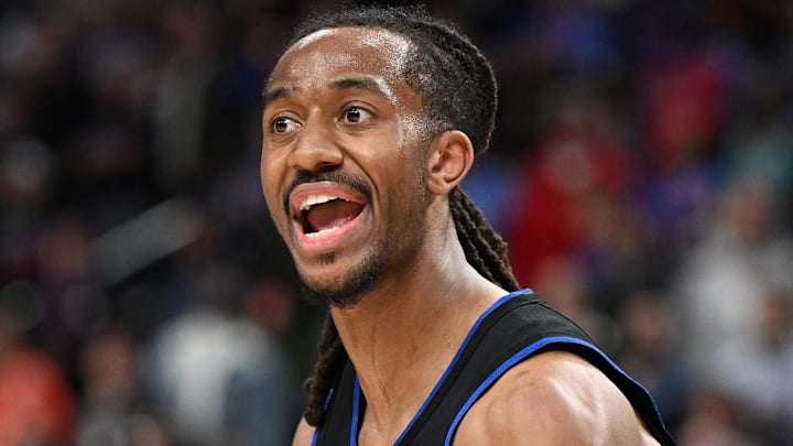 Feb 27, 2026; Detroit, Michigan, USA;  Detroit Pistons guard Daniss Jenkins (24) argues a foul call against the Cleveland Cavaliers with an official in overtime at Little Caesars Arena. Mandatory Credit: Lon Horwedel-Imagn Images
