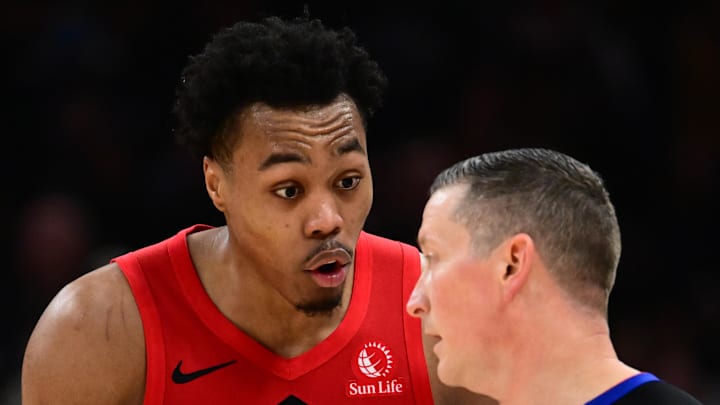 Toronto Raptors forward Scottie Barnes argues a call with referee Nick Buchert.