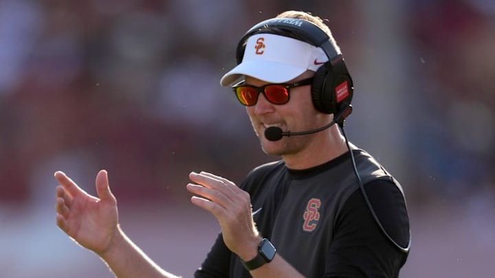 Aug 30, 2025; Los Angeles, California, USA; Southern California Trojans head coach Lincoln Riley watches from the sidelines against the Missouri State Bears in the first half at United Airlines Field at Los Angeles Memorial Coliseum. Mandatory Credit: Kirby Lee-Imagn Images