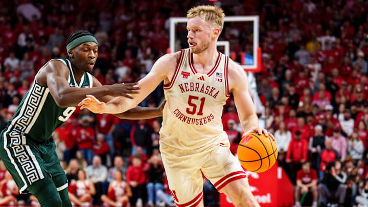 Nebraska forward Rienk Mast drives against Michigan State guard Trey Fort during the first half Friday night.