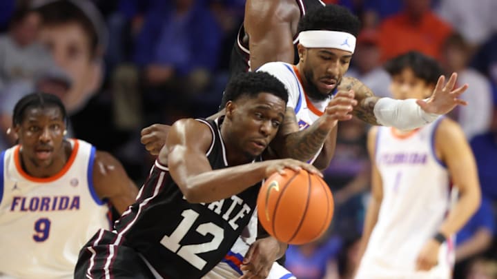 Florida guard Boogie Fland (0) pressures Mississippi State guard Josh Hubbard (12) during the first half of an NCAA mens basketball game at Steven C. O'Connell Center Exactek arena in Gainesville, FL on Tuesday, March 3, 2026. 