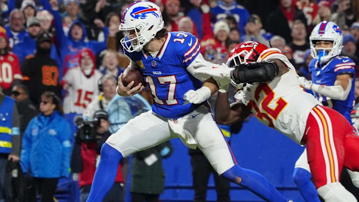 Buffalo Bills quarterback Josh Allen runs for a touchdown against Kansas City Chiefs linebacker Nick Bolton.