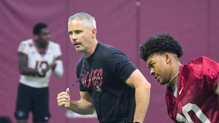 Florida State football football head coach Mike Norvell coaches players up during the final Tour of Duty winter workouts ahead of 2024 spring practices on Thursday, March 7, 2024. Florida State football football head coach Mike Norvell coaches players up during the final Tour of Duty winter workouts ahead of 2024 spring practices on Thursday, March 7, 2024.