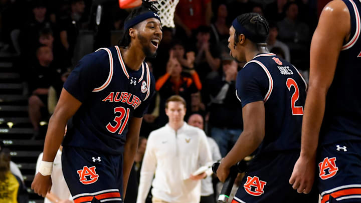 Auburn forward Chaney Johnson and guard Denver Jones celebrate during a recent game.