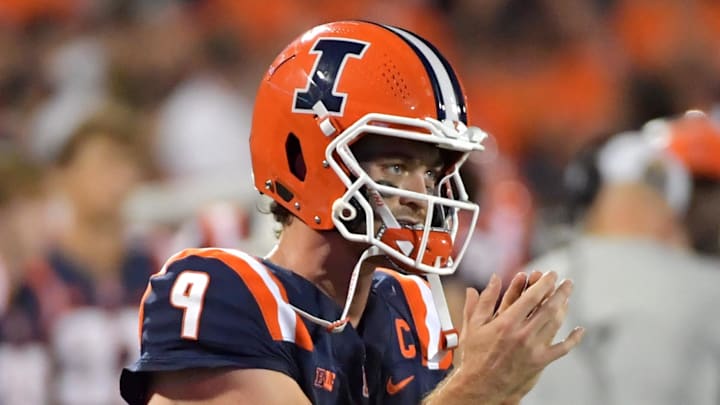 Sep 13, 2025; Champaign, Illinois, USA;  Illinois Fighting Illini quarterback Luke Altmyer (9) applauds teammates during the second half against the Western Michigan Broncos at Memorial Stadium. Mandatory Credit: Ron Johnson-Imagn Images