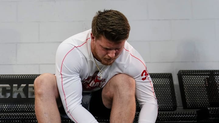 Ohio State Buckeyes defensive end Jack Sawyer (33) ties his shoes for the pro day for NFL scouts at the Woody Hayes Athletic Cente on March 26, 2025.