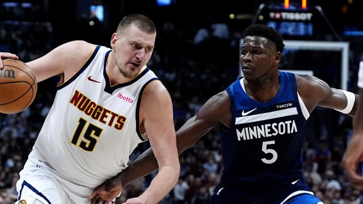 Mar 12, 2025; Denver, Colorado, USA; Minnesota Timberwolves guard Anthony Edwards (5) defends Denver Nuggets center Nikola Jokic (15) in the second half at Ball Arena. Mar 12, 2025; Denver, Colorado, USA; Minnesota Timberwolves guard Anthony Edwards (5) defends Denver Nuggets center Nikola Jokic (15) in the second half at Ball Arena.