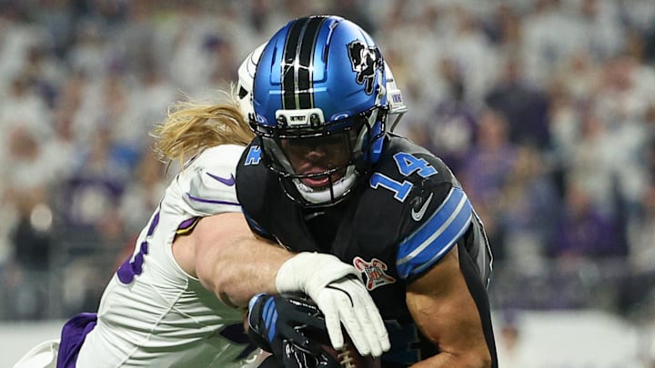 Detroit Lions wide receiver Amon-Ra St. Brown (14).