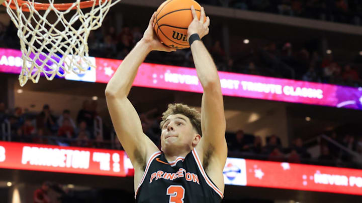 Dec 21, 2024; Newark, New Jersey, USA; Princeton Tigers forward Caden Pierce (3) dunks the ball against the Rutgers Scarlet Knights during the second half at Prudential Center. Mandatory Credit: Tom Horak-Imagn Images