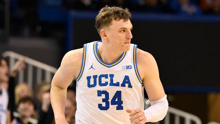 Feb 21, 2026; Los Angeles, California, USA; UCLA forward Tyler Bilodeau (34) runs back on defense after scoring a three-point basket during the second half against the Illinois Fighting Illini at Pauley Pavilion presented by Wescom Financial. Mandatory Credit: Robert Hanashiro-Imagn Images