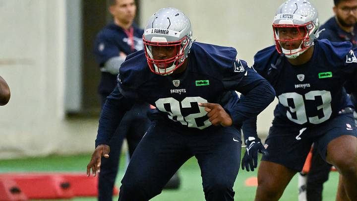 May 9, 2025; Foxborough, MA, USA; New England Patriots defensive tackle Joshua Farmer (92) works out during rookie camp at Gillette Stadium. Mandatory Credit: Eric Canha-Imagn Images