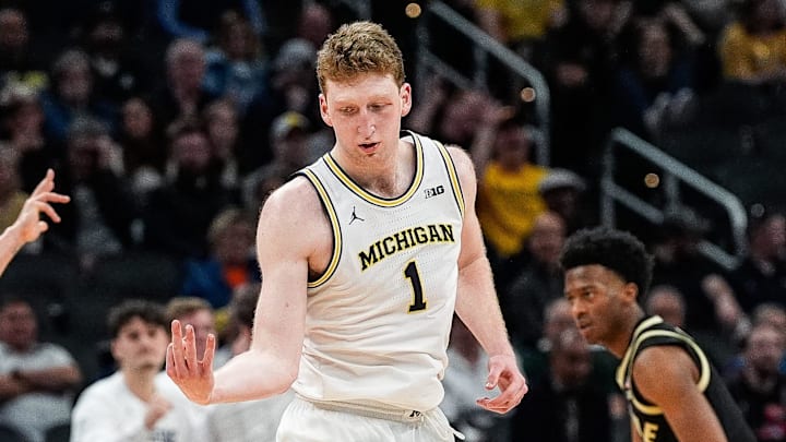 Michigan center Danny Wolf celebrates a 3-point basket against Purdue during the second half of a Big Ten Tournament quarterfinal at Gainbridge Fieldhouse in Indianapolis on Friday, March 14, 2025.