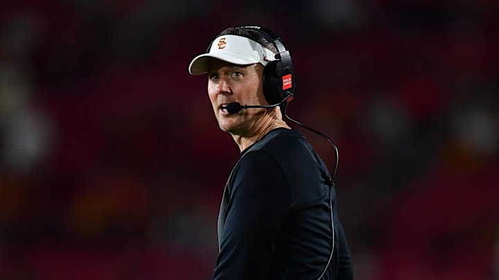 Sep 20, 2025; Los Angeles, California, USA; Southern California Trojans head coach Lincoln Riley watches game action against the Michigan State Spartans during the second half at the Los Angeles Memorial Coliseum. Mandatory Credit: Gary A. Vasquez-Imagn Images Sep 20, 2025; Los Angeles, California, USA; Southern California Trojans head coach Lincoln Riley watches game action against the Michigan State Spartans during the second half at the Los Angeles Memorial Coliseum. Mandatory Credit: Gary A. Vasquez-Imagn Images